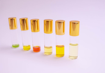 Perfume sampleson white background. Beautiful composition with perfume samples on light backgroundPerfume roller tester