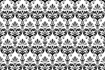 Wallpaper in the style of Baroque. Seamless vector background. White and black floral ornament. Graphic pattern for fabric, wallpaper, packaging. Ornate Damask flower ornament
