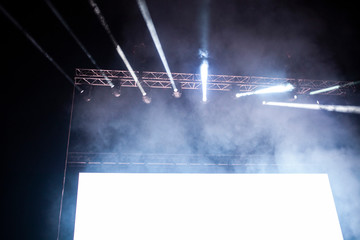 empty white board with copy space and stage lights - banner for music festival