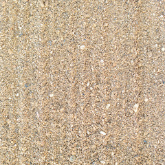 Top view of seashore, clean sand texture of natural surface.