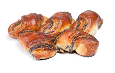 Heap of fresh buns with poppy seed