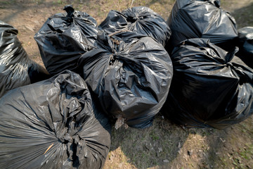 Large black garbage bags.