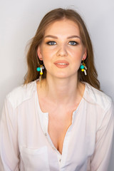 Curly long hair blonde young model. Beauty girl with curly perfect hairstyle Limited depth of field