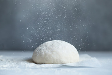 Dough for pizza on the table