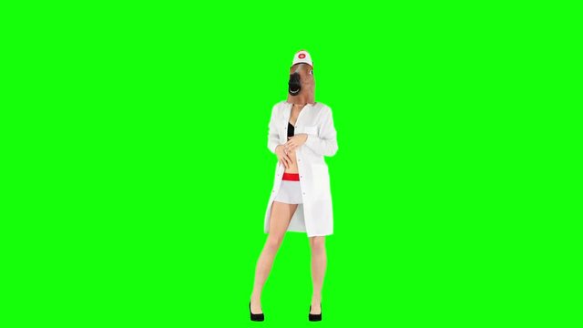 Funny Nurse Performing a Striptease Therapy for a Patient Green Screen