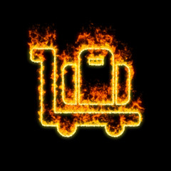 Fototapeta premium The symbol luggage cart burns in red fire