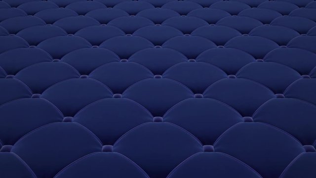 3D animation of flying a blue quilted velvet surface with light blue drawstrings. Looped video.