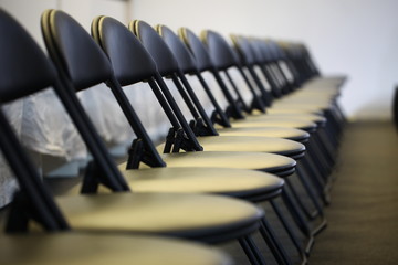 rows of chairs in the conference room