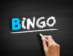 Bingo text on blackboard, concept background