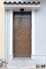 contemporary house entrance metalic brown door, Athens Greece