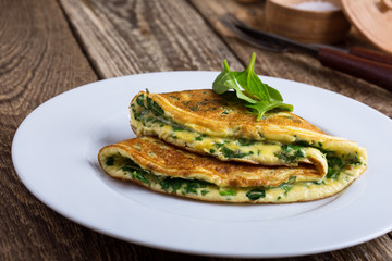 Baby spinach and parmesan cheese omelette, healthy vegetarian breakfast