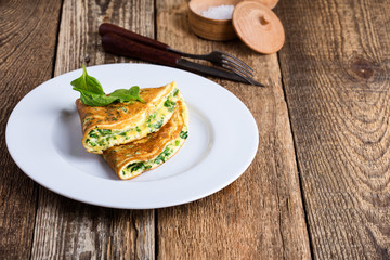 Baby spinach and parmesan cheese omelette, healthy vegetarian breakfast