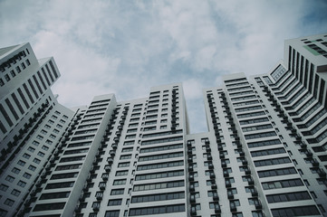 Fototapeta premium high multistory building against the blue sky