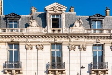 Fototapeta na wymiar Paris, ancient buildings, typical apartments in a luxurious neighborhood 
