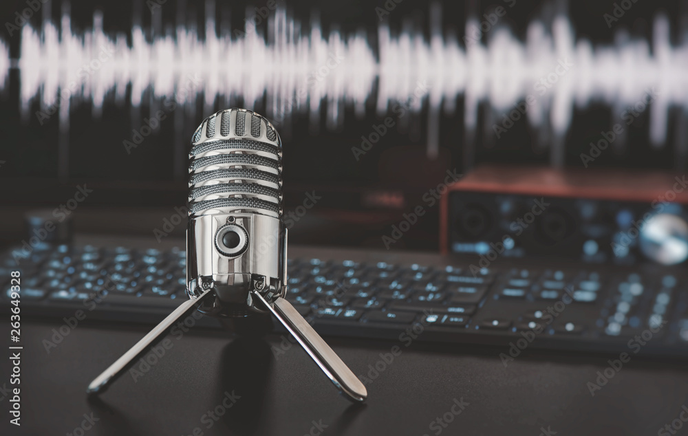 Wall mural microphone on a table. Home audio recording concept