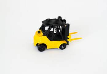 small toy yellow forklift