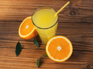 Homemade orange juice on a wooden table