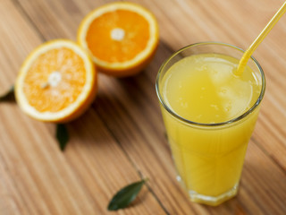 Homemade orange juice on a wooden table