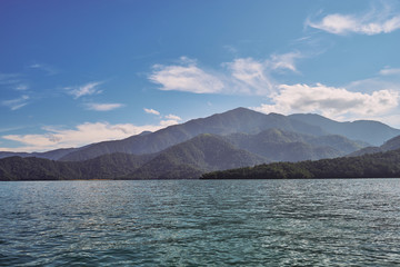 Beautiful nature scenics of Sun Moon Lake with the surrounding mountains are the highlight at this sprawling lake at Yuchi, Nantou in Taiwan.