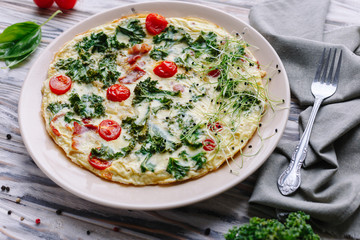 Omelette with vegetables.