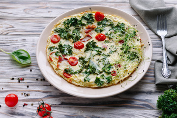 Omelette with cherry and cabbage