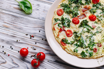 Omelette with cherry and cabbage.