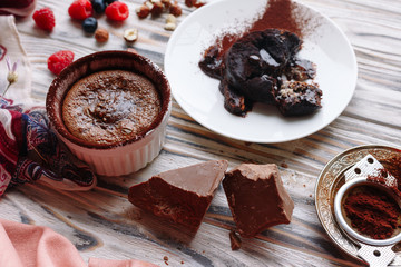 Homemade chocolate cupcake with nuts and berries 