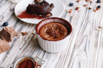 Homemade chocolate cupcake with nuts and berries