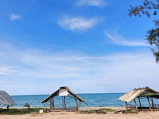 Shack on the beach with blue sky and cloud at Thailand, Space for text in template, Travel concept, Many tourists visit here, View for seascape