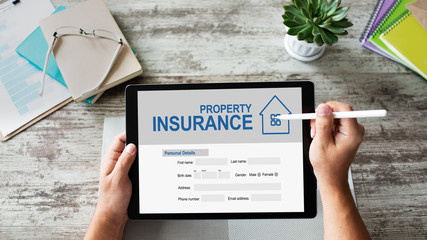 Fototapeta na wymiar Property insurance online application form. Business and internet concept.