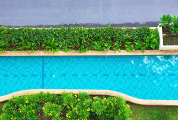 top view Beautiful blue water ,swimming pool for background and empty white floor .Blank space for text and images.