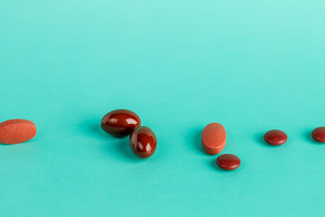 Different brown medicinal tablets and capsules