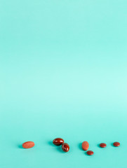 Different brown medicinal tablets and capsules