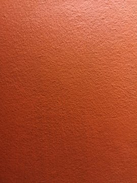 cement wall piant red color rough texture background crack concrete material