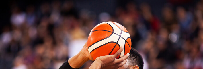 basketball player shooting three pointer