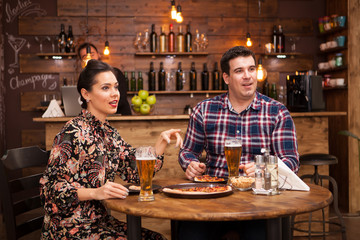 Young couple together having a great time .