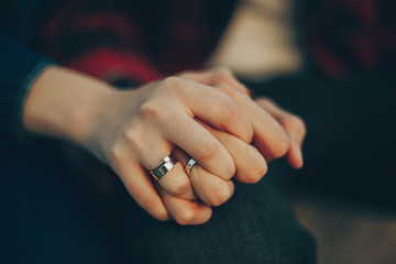 Fototapeta na wymiar wedding rings on hands