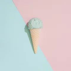  Ice cream on pastel pink and blue background. Minimal summer food concept. Flat lay. © Zamurovic Brothers