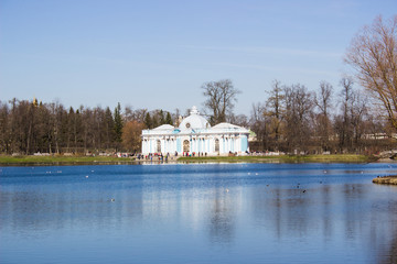 Fototapeta premium Tsarskoye Selo, Pushkin. Suburb of St. Petersburg, Russia. View of the park, lake and bridge