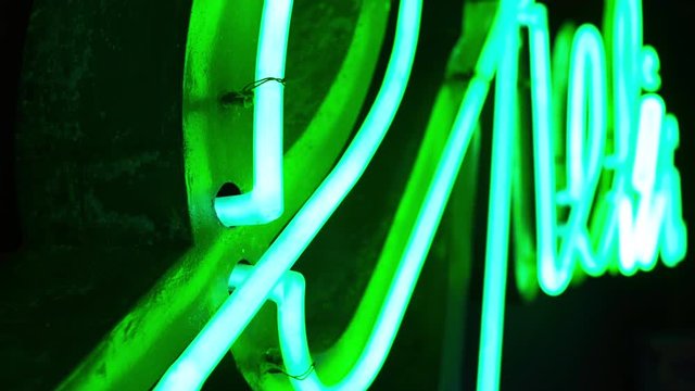 crop footage of a green neon