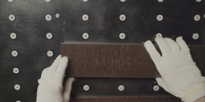 Products from environmentally friendly material. Preparations from DVP. Production dvp. Master on the machine on dvp. Wood fiber plate.