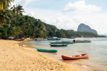 Fototapeta na wymiar Corong Corong beach with traditional boats in El Nido, Palawan island, Philippines