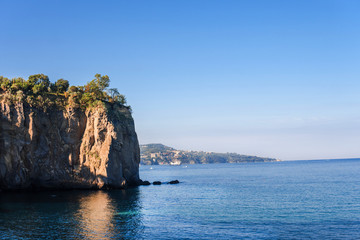 Fototapeta premium Kind on mountain and small town under mountain olive tree travel concept design