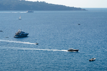 Obraz premium luxury boat, yaht floating on the water, blue sea and sky with copyspace, transportation relax and trip concept