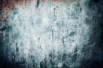 Old blue grungy wall background or texture