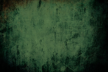 Dark green grungy wall background or texture