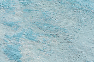 Abstract background decorative light blue plaster wall.