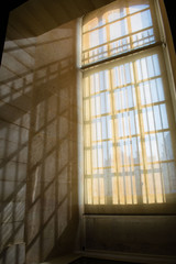 Window shadow on wall at the louvre castle