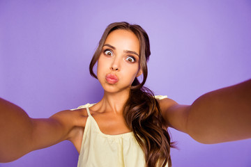 Closeup photo portrait of pretty excited comic joking humor nice glad ecstatic crazy she her lady holding web cam using hands having video call blogger influencer isolated violet background