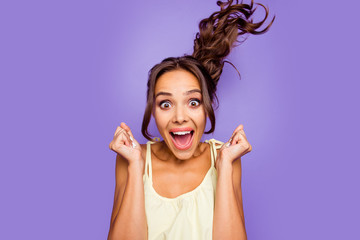Close-up photo portrait of cool in summer casual clothing astonished delightful she her lady raising hands fists up wants to go shopping sale season isolated violet background